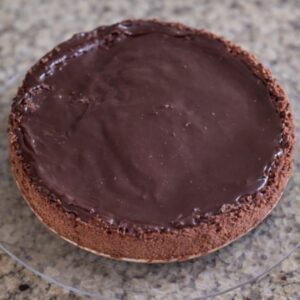 Chocolate cake with smooth, glossy frosting.